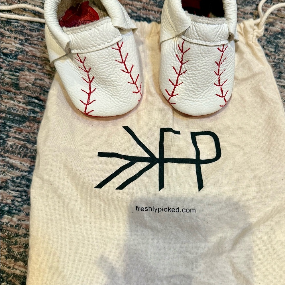 Freshly Picked White Moccasins with Red Stitching